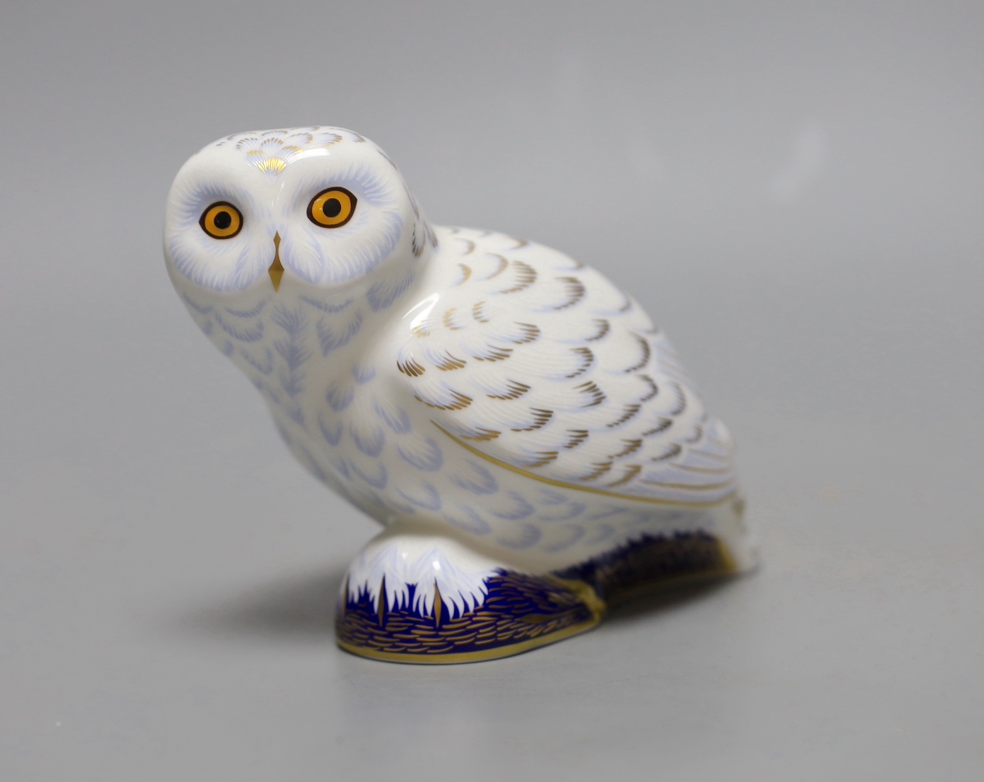A Royal Crown Derby paperweight - Snowy Owl, gold stopper, boxed, no certificate.